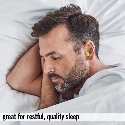 Man sleeping with Snore Blockers Soft Foam Earplugs 100 Pairs in a Tub Individually Wrapped High NRR 32 dB SNR 37 dB for quiet rest