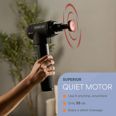 Person holding Sonic LX Heated Massage Gun For Deep Tissue Muscle Recovery with quiet motor in action