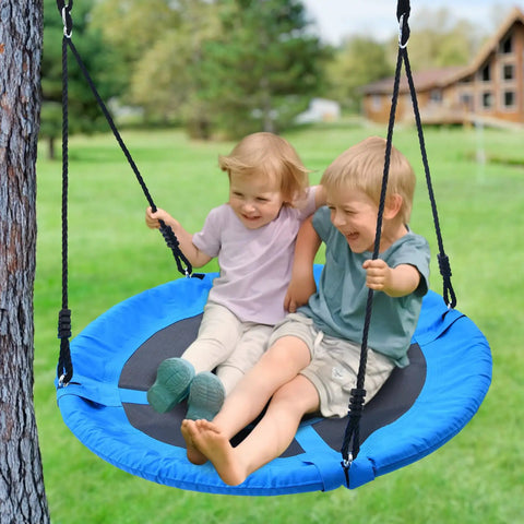 Two kids enjoying a Heavy Duty 700Lb 40 Inch Saucer Tree Swing For Kids And Adults, Outdoor Backyard Swing, Blue, hanging from a tree.