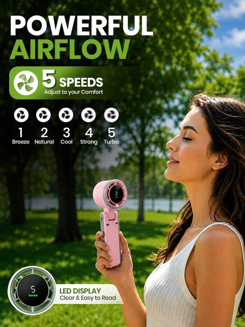 Person using Rechargeable Handheld USB Fan With 5 Speeds For On The Go Personal Cooling Breeze Foldable Battery Operated Travel Fan