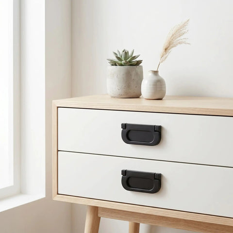 Two Pack Recessed Door Pulls Matte Black Zinc Alloy Flush Handles For Cabinets And Drawers on a light wooden cabinet