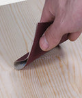 Emery Cloth Roll Set With Dispenser, 5 Grits 150 240 320 400 600 Sandpaper Rolls For Wood And Metal Polishing, seen sanding wood surface.