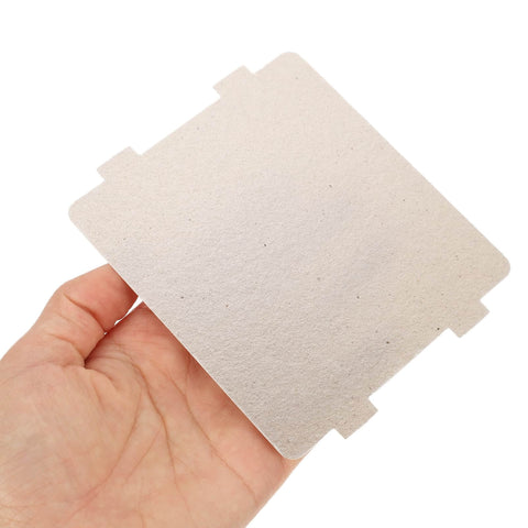 Hand holding one piece from 10 Pack Microwave Mica Insulation Sheets Heat Resistant Crisper Covers For Microwave Protection Cooking Grease Stain Prevention Extend Microwave Lifespan And Keep Appliances Clean