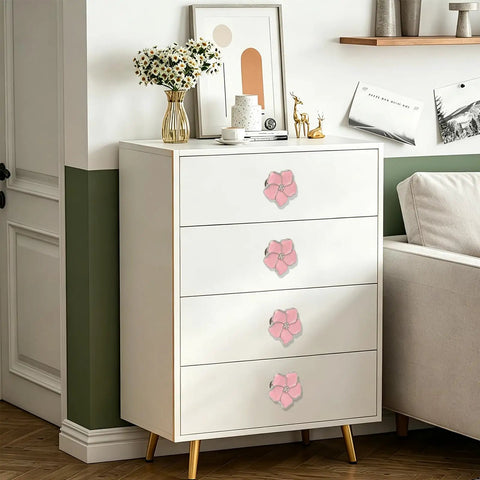 Top Shelf Pink Floral Cabinet Knobs And Drawer Pulls Set Of Four Damn Cute Petal Handles on a white dresser with pink accents.