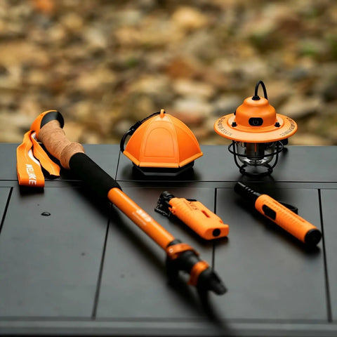 2-In-1 Camping Light And Tent Lantern For Outdoor Adventures, Waterproof Portable Lantern In Bright Orange on table