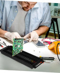 Six Pack Circuit Board Rack Antistatic Holder Stand For PCB Storage And Display with man working on electronics lab bench.