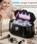 Blast Daily Grime With This Legit Ultrasonic Jewelry Cleaner Using Fifty KHz Waves For Nitty Gritty Cleaning On Rings Eyewear Retainers And Straps Alongside A 420 Ml Tank And Sleek Black Design, featuring 420ml cleaner with items inside.