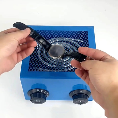 Hands placing watch on Watch Dryer For Jewelry Repair And Parts, Electric Drying Machine With Adjustable Temperature And Timer.