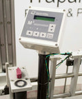 Heavy Duty Compact Modular Label Applicator Built Tough For Relentless Shifts Runs Smooth And Places Labels On Point Daily With Zero Hassle Or Unnecessary Downtime For Factory Floors control panel close-up with buttons and display.