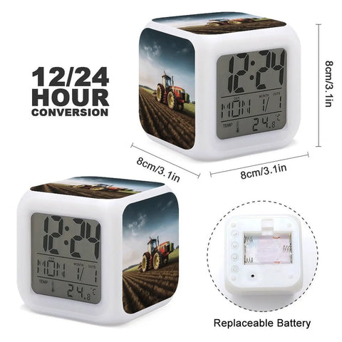 Tractor Farm Alarm Clock With LED Display And 7 Color Night Light showing time and temperature, with replaceable battery compartment.