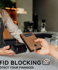 Person using Slim Card Wallet For Men With RFID Blocking Minimalist Front Pocket Pop Up ID Window, Everyday Carry Essential, Leather Build.