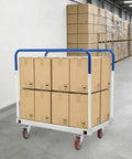 Beefy Heavy Duty Moving Dolly With 1500 Lb Capacity, Steel Platform Cart, Four Wheel Panel Cart, Rugged Steel Frame For Moving Heavy Gear And Equipment, Ideal For Garages, Warehouses, And Loading Jobs, Smooth Roll With Four Wheel Design loaded with boxes in a warehouse