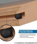 Close-up of Quarter Inch Rubber Ball Cabinet Door Spacers in wooden groove, illustrating alignment for panel stability.