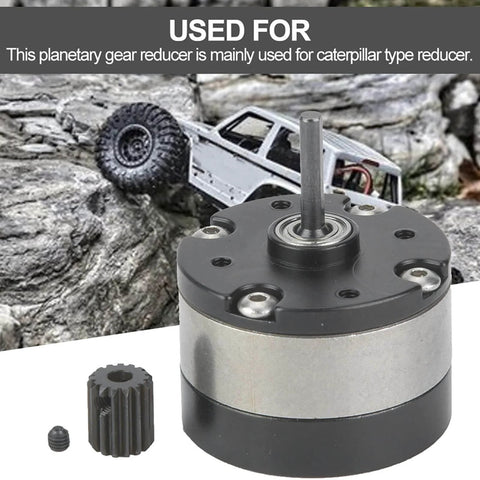 Planetary Gearbox Reduction Motor For RC Cars And Trucks on rocky terrain showcasing output shaft and all-metal gear.
