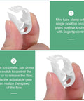 Hand holding mini white tube clamp from five pack adjustable plastic tubing clamps for one eighth to one quarter inch tubing water flow control tube clips for beer bottles plumbing instruments and equipment white.