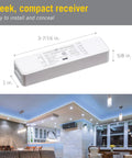 Slim receiver of RGB Plus White WiFi LED Controller For Smart Home Lighting With Tuya App, shown in modern kitchen setting.