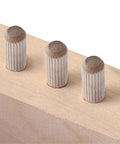 Pro Grade 900 Pieces Wooden Dowel Pins Kit For Woodworking Doweling Jig Set Round Fluted Wooden Plugs Pins And Rods Locator Furniture Fittings In 6mm And 10mm Sizes Handy For Crafts And DIY Projects. 3 wooden dowel pins in a wood board