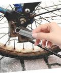 Get Your Fix With This Awesome 8 Pcs Small Tension Spring Kit Offering Heavy Duty Compression And Extension Springs Perfect For Ev Parking Stands, Ladder Feet, And Various Diy Mechanical Projects That Need Reliable Elasticity And Easy Installation Every. stainless steel tension spring on bike wheel hub, held by hand