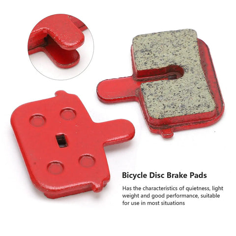 Close-up of eight piece disc brake pads set for bikes quiet lightweight resin semi metal braking replacement for electric vehicles.