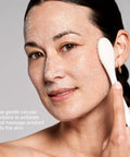 Woman using Pore Polishing Wand Silicone Facial Cleansing Brush Game Changer Dual Sided Face Scrubber for gentle exfoliation
