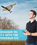 Man flying StarFlux Dual Flight Balsa Wood RC Airplane Kit Build Fly And Flip Between Normal Stable Mode And Canard Agile Mode.