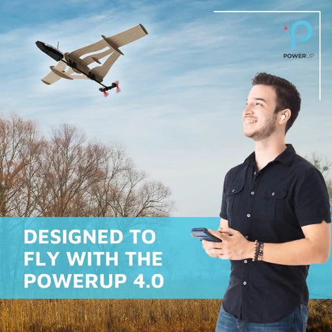 Man flying StarFlux Dual Flight Balsa Wood RC Airplane Kit Build Fly And Flip Between Normal Stable Mode And Canard Agile Mode.