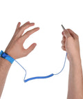 Person using blue 3 Pack Anti Static Wrist Straps With Grounding Wire And Alligator Clip Reusable ESD Protection Kit