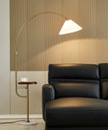 Gold Floor Lamp With Integrated Table Tray And Dual USB Ports Long Arm Reading Light beside leather sofa in living room