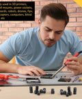 Man using 200 Pcs Black Nylon Spacers Half Inch Thick, Half Inch Outer Diameter, 0.194 Inch Inner Diameter for electronics.