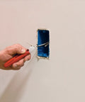 Two Piece Electrical Safety Kit With Non Contact Voltage Tester And GFCI Outlet Tester in use detecting voltage in wall