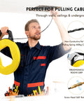 Heavy Duty 164 Foot Fiberglass Fish Tape Cable Puller Kit Featuring A Spring Drum Reel And Non Conductive Core That Routes Electrical Wire No Sweat Through Conduit in use overhead.