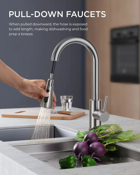 Person using Brushed Nickel Kitchen Faucet With Pull Down Sprayer Built For No Fuss Real Life Heavy Duty High Arc Single Handle