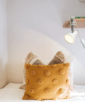 Lit Clip On LED Reading Light 5W 400LM with 330 Degree Rotation Clamp attached to a shelf illuminating a bed with pillows