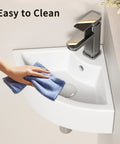 Triangle Corner Sink for Bathroom, Wall Mounted Ceramic Vessel Sink, White Gloss Finish Space-Saving design being cleaned with a cloth.