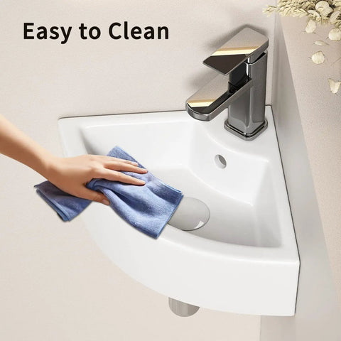 Triangle Corner Sink for Bathroom, Wall Mounted Ceramic Vessel Sink, White Gloss Finish Space-Saving design being cleaned with a cloth.