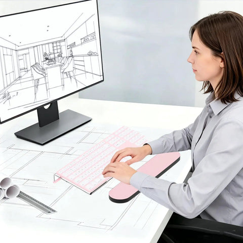 Woman typing on computer with Clear Acrylic Tilted Keyboard Stand For Ergonomic Typing Low Front Lip Keeps Your Keys In Place.