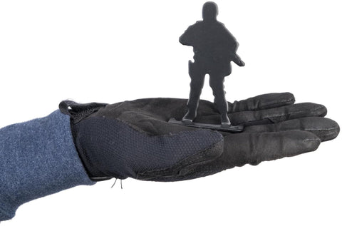 Gloved hand holding Big Bang Steel Target for Airguns Standing Soldier Popper 6 Pack Heavy Duty Plinking Target with Audible Ping and Easy Manual Reset Pre Drilled Mounting Holes for Quick Setup.
