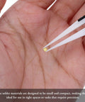 150 Pieces Gold Plated Copper Solder Chips For Jewelry Making And Electronics Repair Easy Welding Tabs held by tweezers