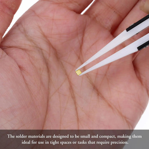 150 Pieces Gold Plated Copper Solder Chips For Jewelry Making And Electronics Repair Easy Welding Tabs held by tweezers