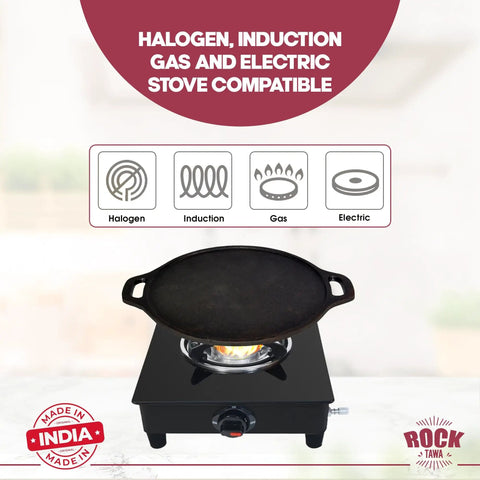 Heavy Duty 14 Inch Cast Iron Dosa Tawa Pre Seasoned Flat Griddle sizzles on gas stove, compatible with induction and electric.