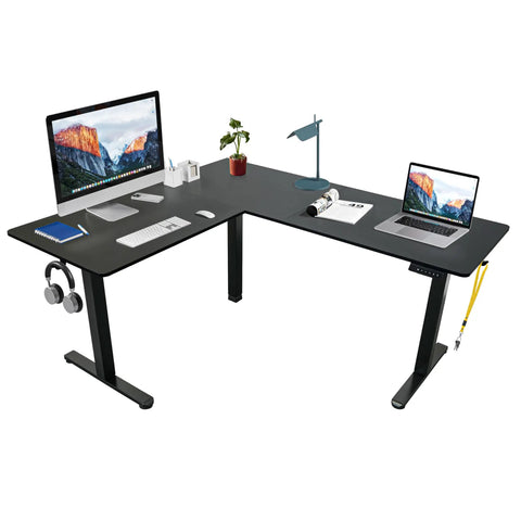 Boss Level L Shaped Electric Standing Desk With Smooth Glide Motors And Three Memory Presets For A Sick Gaming Station Or Remote Work Hub In Sleek Black Finish. L-shaped desk with dual monitors, laptop, and accessories.