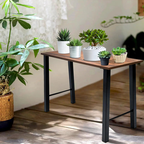 Coffee table with 20 Inches Metal Coffee Table Legs Set Of 2 With Pre Drill Holes Industrial Black supports, wooden top, plants.