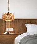 Two Pack Mini Rattan Plug In Pendant Lights Hand Woven Boho Ceiling Fixture With Switch Easy Install Home Upgrade For Bedroom Entryway Hallway Cozy Vibes, hanging over a bedside table.