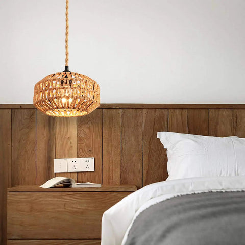 Two Pack Mini Rattan Plug In Pendant Lights Hand Woven Boho Ceiling Fixture With Switch Easy Install Home Upgrade For Bedroom Entryway Hallway Cozy Vibes, hanging over a bedside table.
