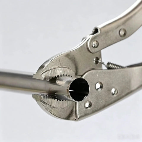 Close-up of Premium Steel Locking Pliers With Wire Cutter gripping a metal pipe for secure fastening.