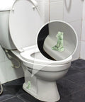 Kick Up Your Bathroom Style With These Pretty Dang Cute Ceramic Frog Toilet Bolt Cover Set Featuring Sturdy Tank Caps And Whimsical Hardware Accessories - close-up of glazed green frog cover on toilet.