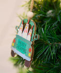 Chickmas Farmhouse Style 3D Wooden Christmas Ornament Four Inch Hanging Chicken Decor on green tree branch