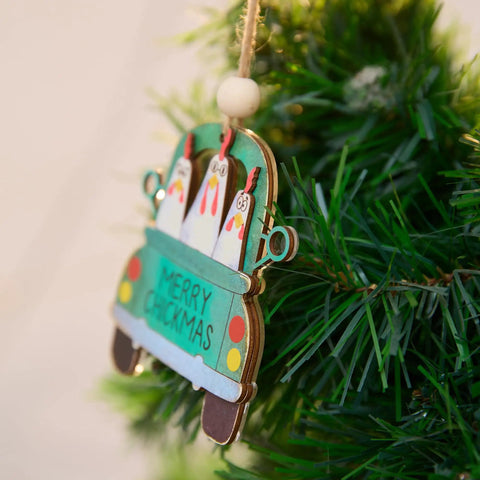 Chickmas Farmhouse Style 3D Wooden Christmas Ornament Four Inch Hanging Chicken Decor on green tree branch
