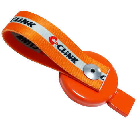 Orange retractable key reel with CLINK-branded strap for UFP surge brake lockout on boat trailer.