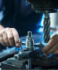 Mechanical work with tools, focusing on precision equipment handling, not directly related to Heavy Duty Straight Shape Cotter Pins Kit 410 Pieces Galvanized Steel Assortment For Trucks Tractors Trailers And More Replacement And Maintenance Hardware Pins For Construction Automotive And Machinery.